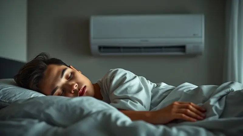 Pessoa dormindo tranquilamente em um quarto confortável, demonstrando a principal vantagem de um ar-condicionado silencioso para uma noite de sono.